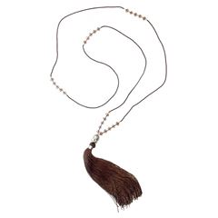 Bild von Halskette Buddha Mala braun mit 25 Glasperlen 48 cm