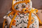 Bild von Bee Bloom Muff Tea Cosy - Ulster Weavers