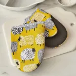 Bild von Dotty Sheep Microwave Mitts - Ulster Weavers