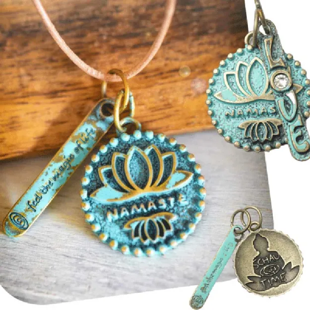 Bild von Namasté / Love Twin-Amulett mit Ziegenlederband